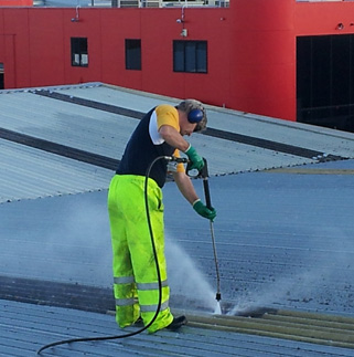 Water blasting a roof